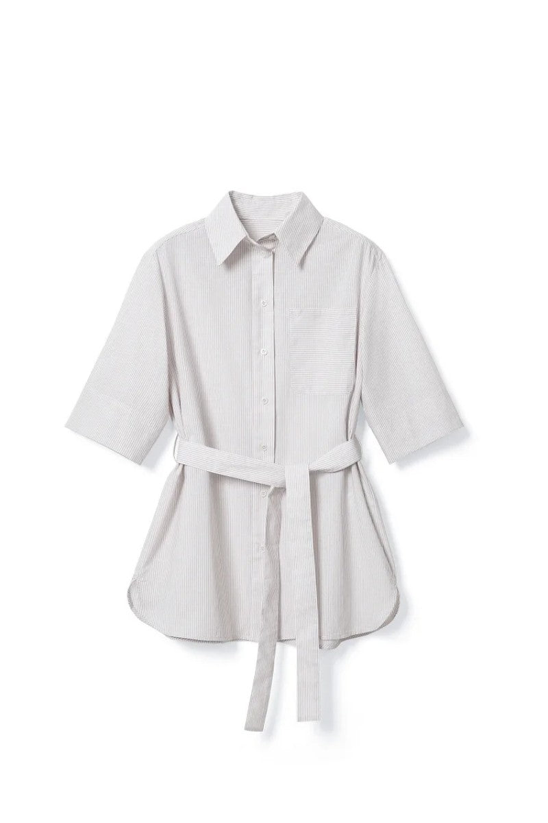 The French-style dress features a fitted long-length design Tracymade 4（S） griege