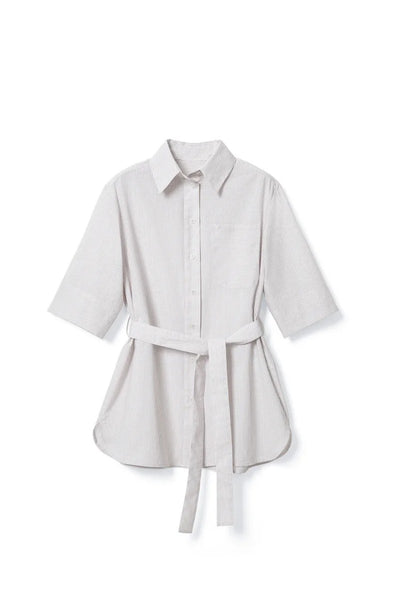 The French-style dress features a fitted long-length design Tracymade 4（S） griege